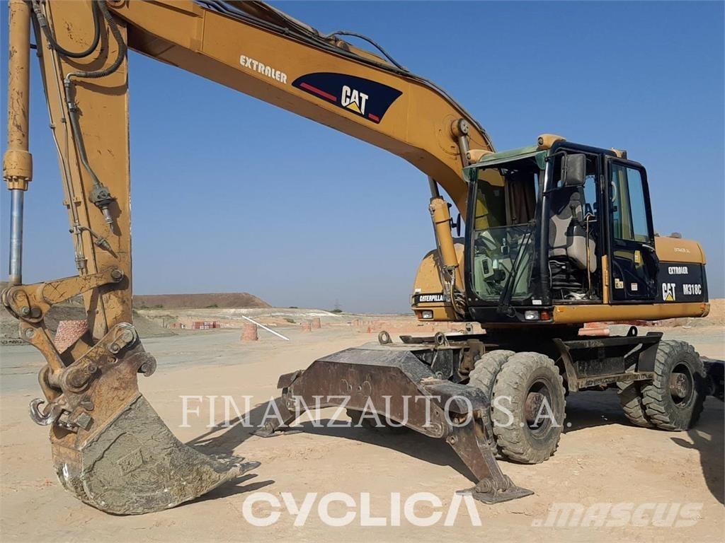 CAT M318 Bageri na kotačima