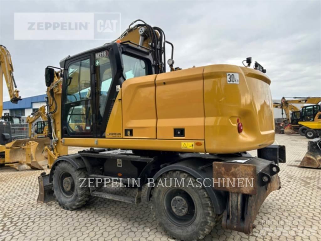CAT M318-07A Bageri na kotačima