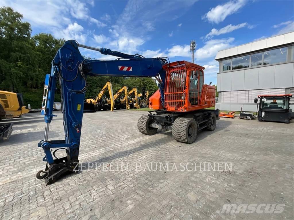 CAT M318-07A Bageri na kotačima
