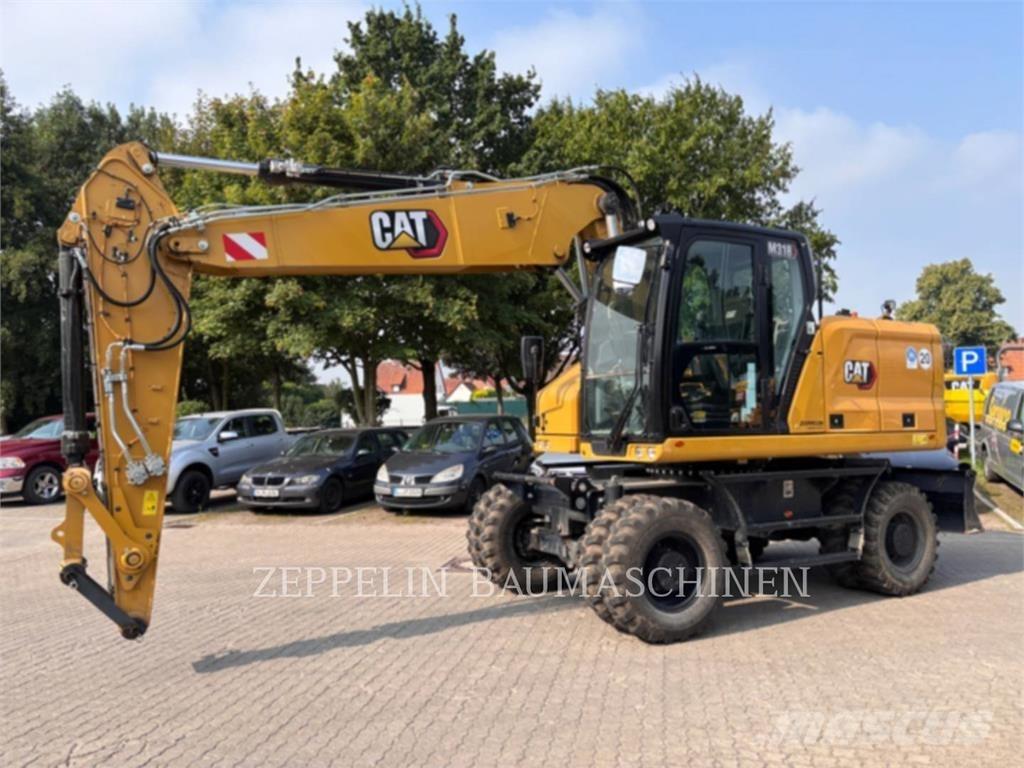 CAT M318-07A Bageri na kotačima