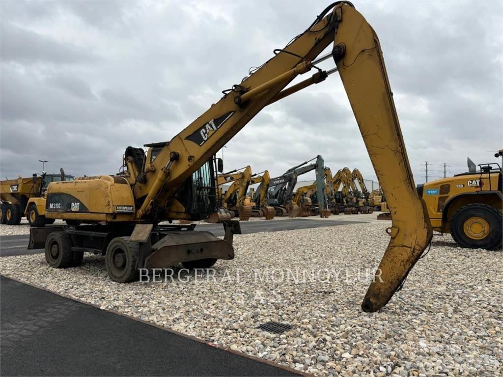 CAT M318C Bageri na kotačima