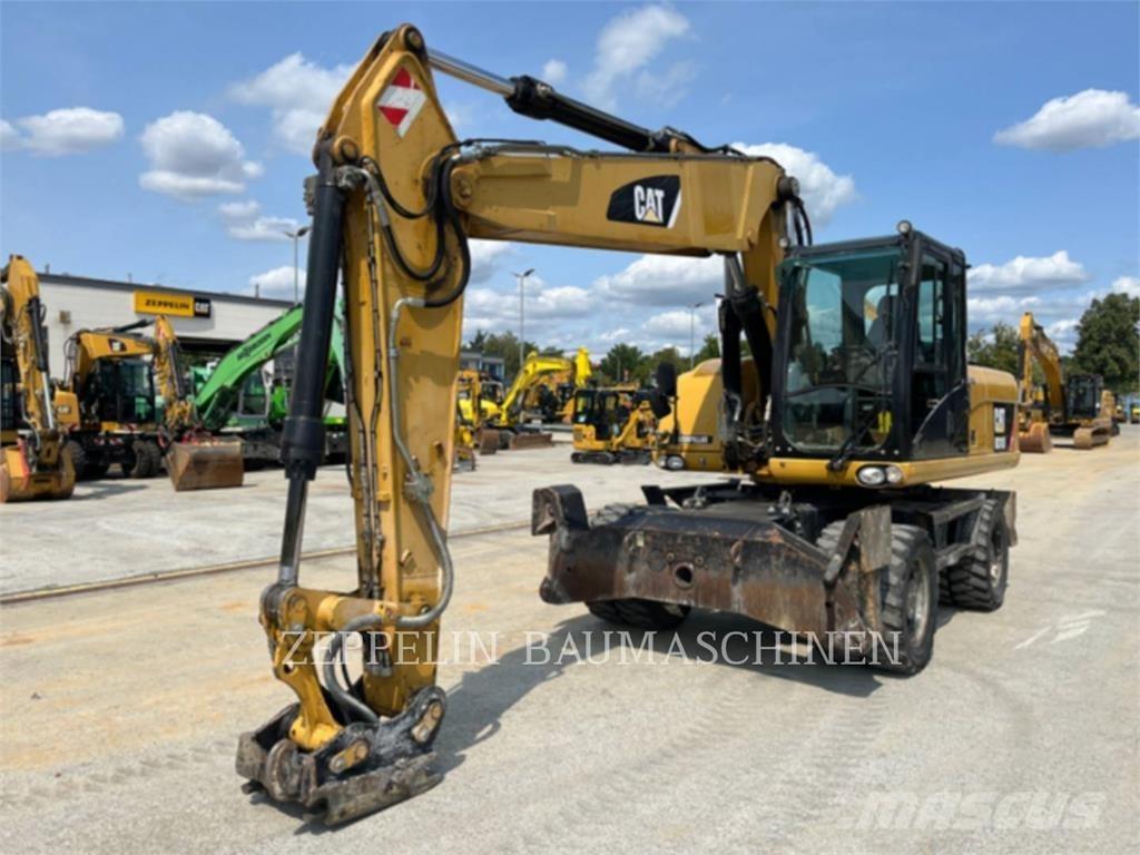 CAT M318D Bageri na kotačima