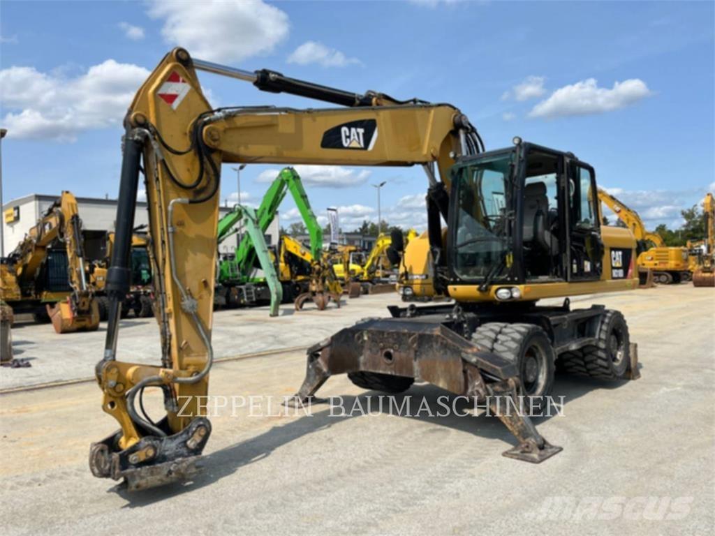 CAT M318D Bageri na kotačima