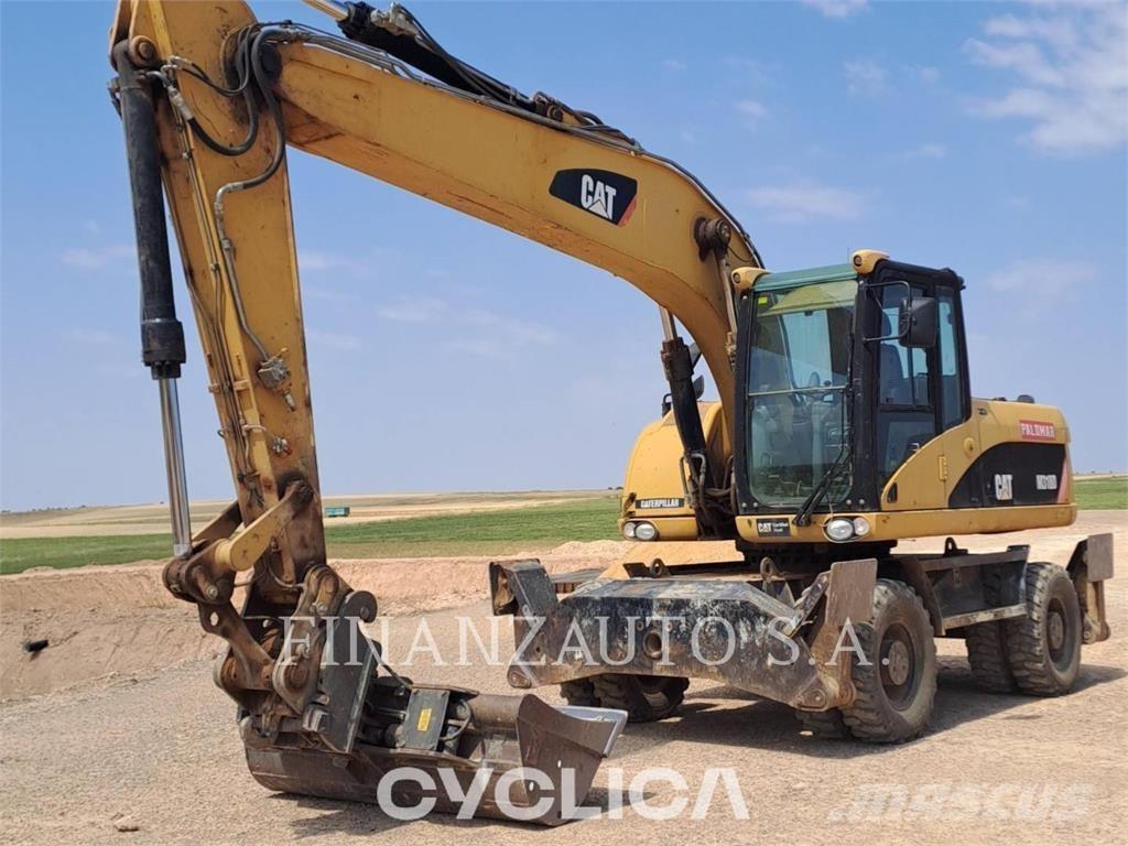 CAT M318D Bageri na kotačima