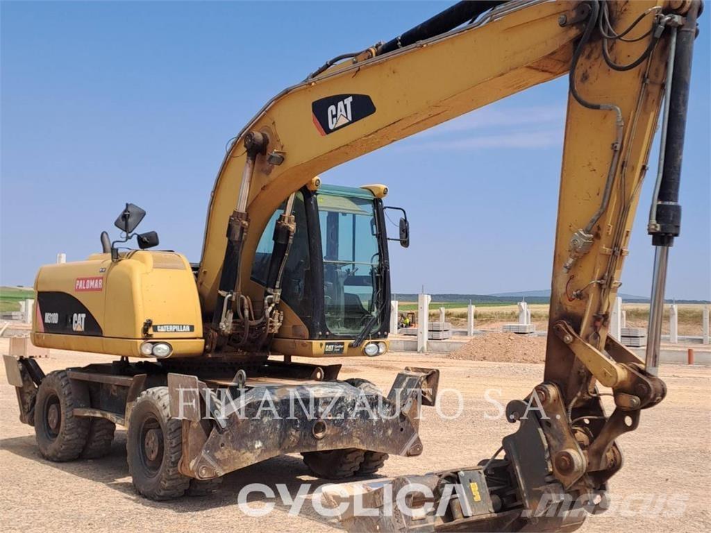 CAT M318D Bageri na kotačima