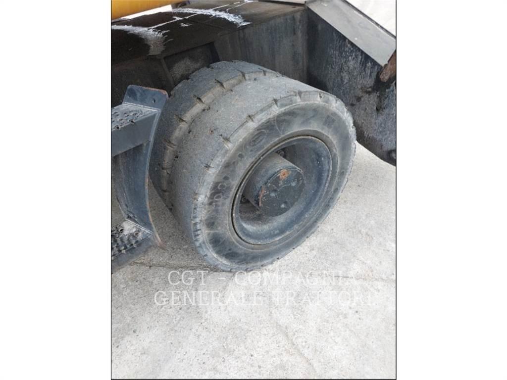 CAT M318D MH Bageri na kotačima