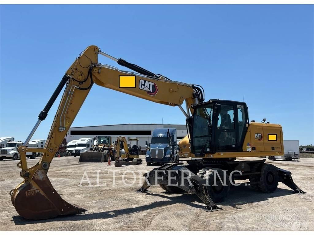 CAT M320 Bageri na kotačima