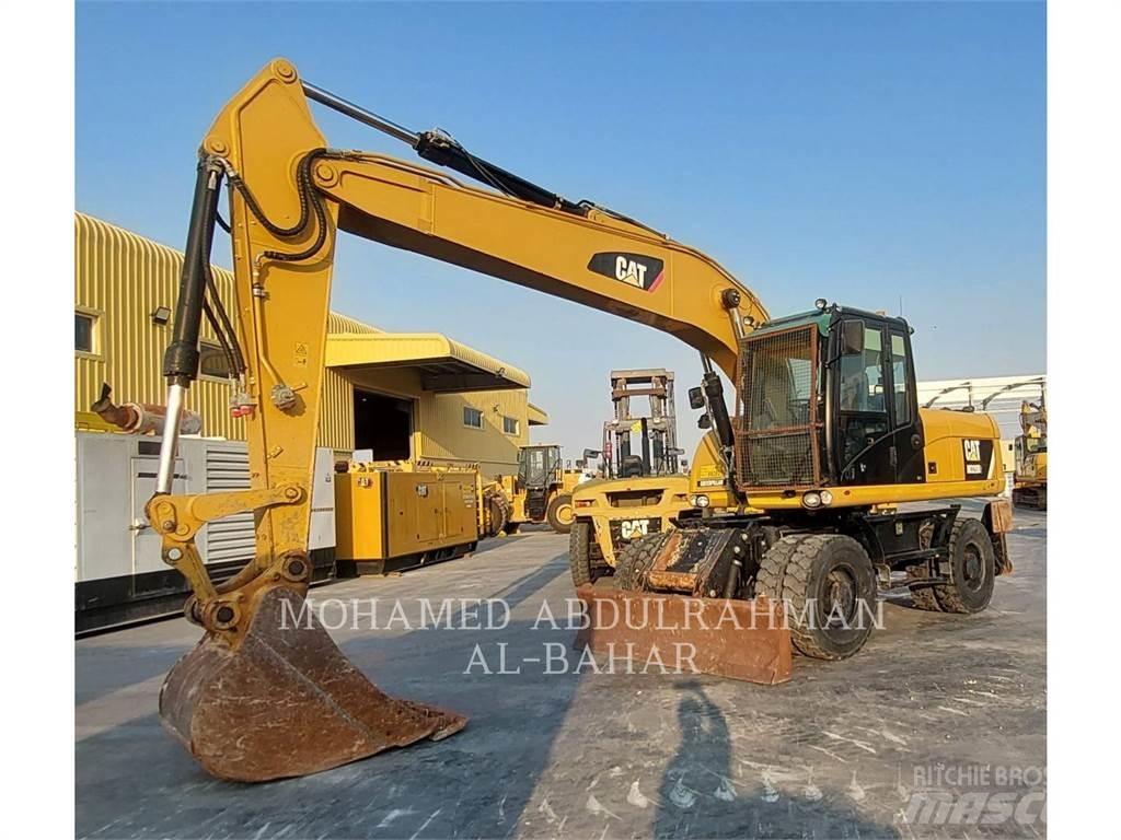 CAT M320D2 Bageri na kotačima