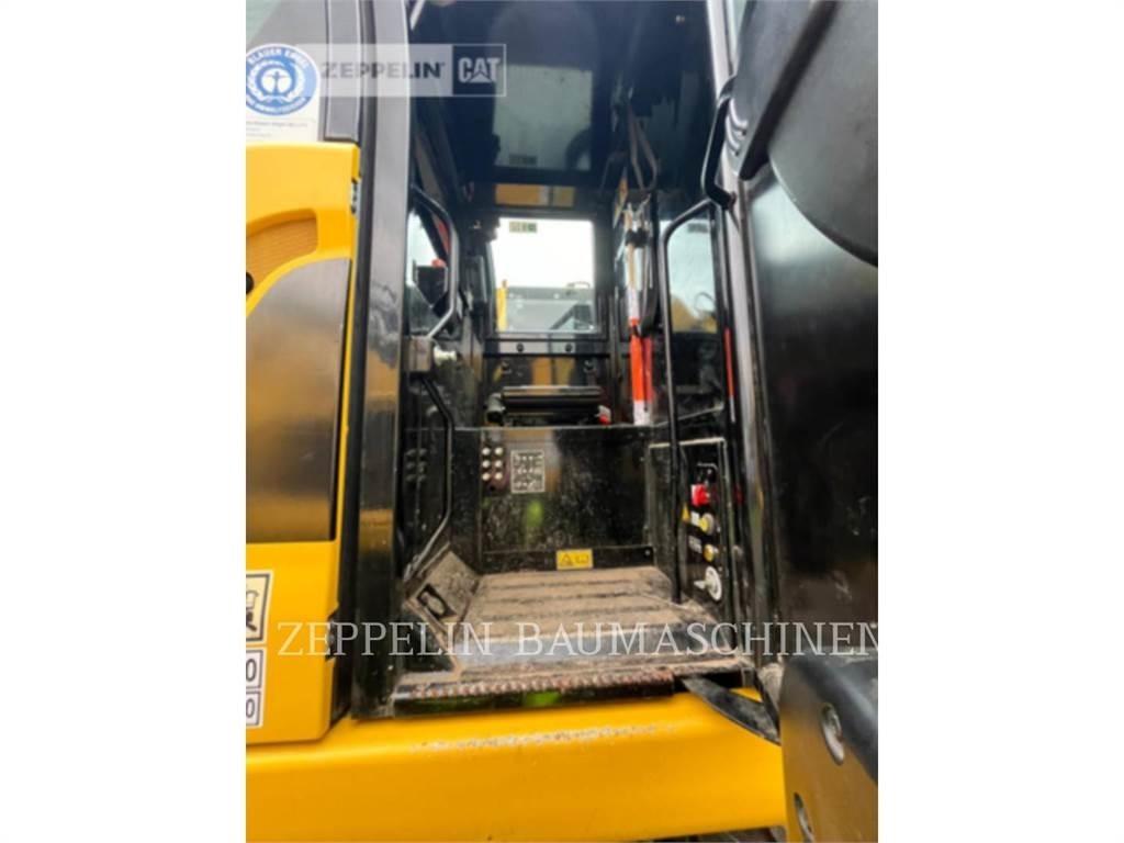 CAT M323F Bageri na kotačima