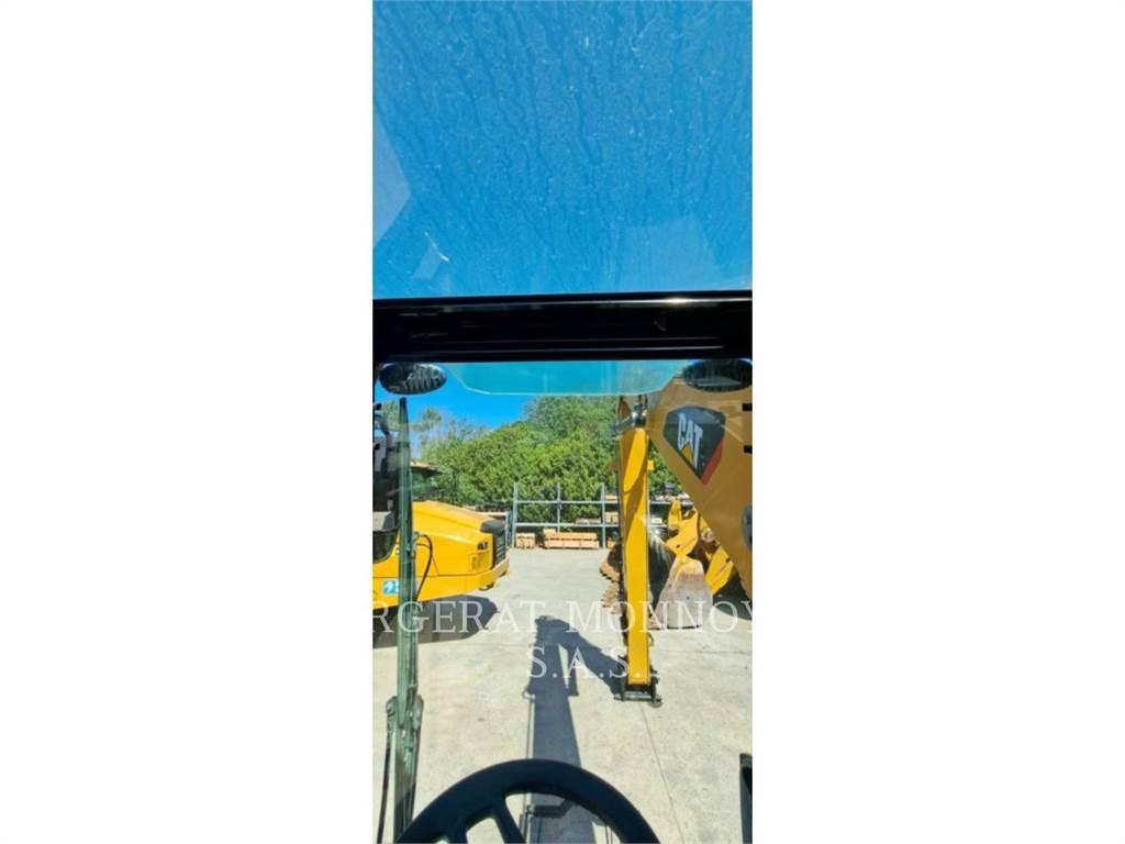 CAT MH3024-06 Bageri na kotačima