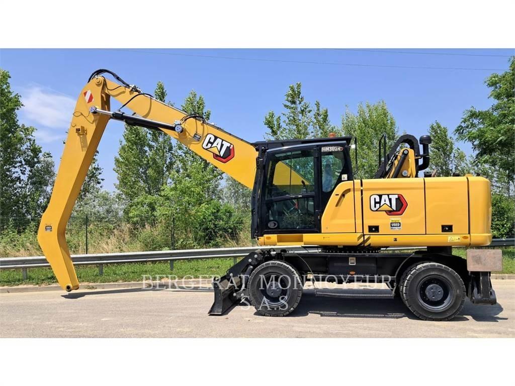 CAT MH3024-1 Bageri na kotačima