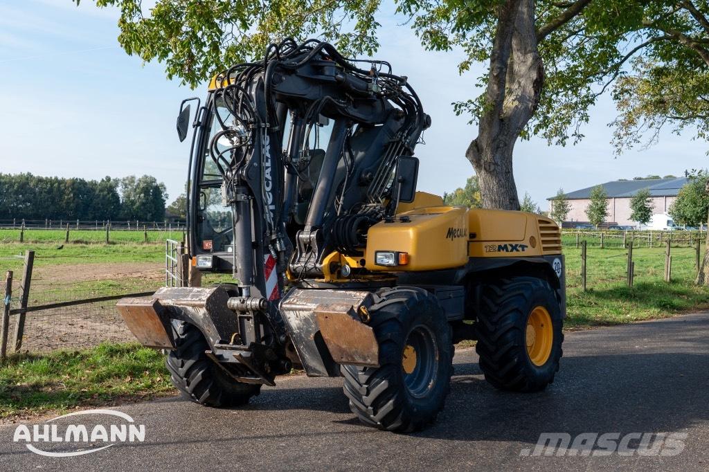 Mecalac 12 MXT Bageri na kotačima