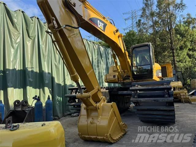 CAT 320 C Amfibijski bageri