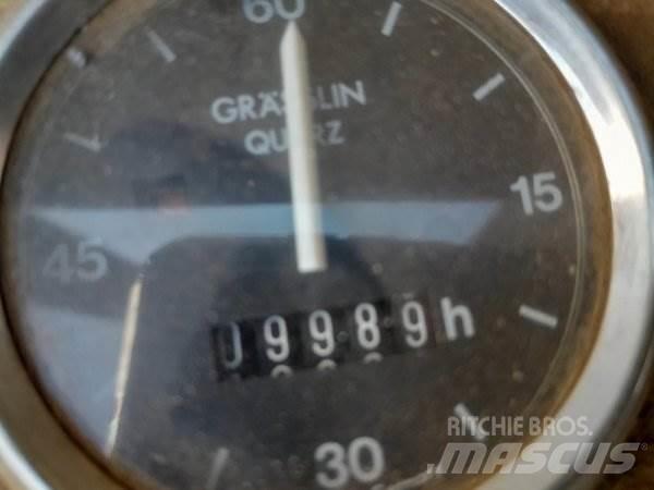 Fuchs 713 Bageri za manipuliranje materijalom / otpadom