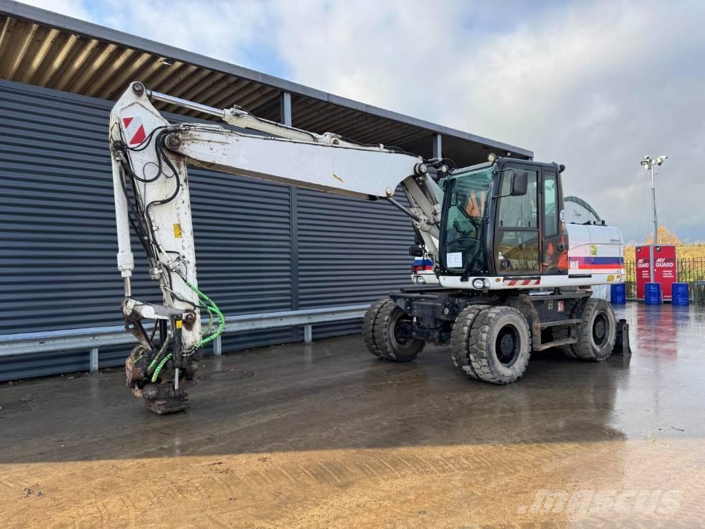 CAT M315D Bageri na kotačima