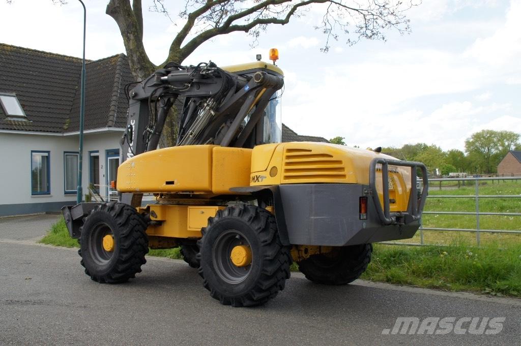 Mecalac 12 MXT Bageri na kotačima