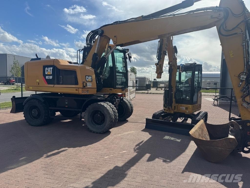 CAT 318 Bageri na kotačima