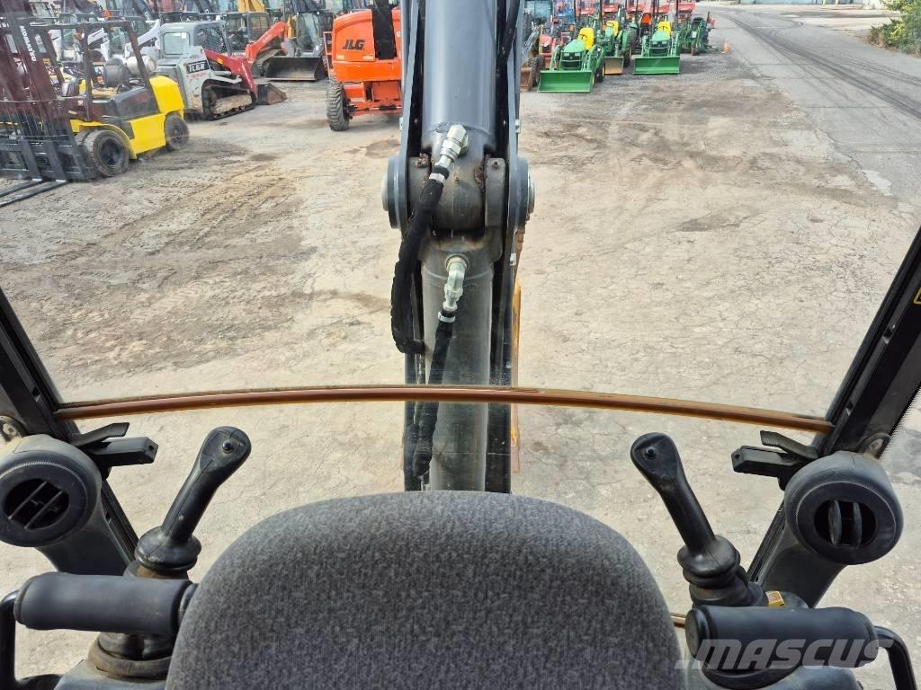 John Deere 310 Utovarni rovokopači