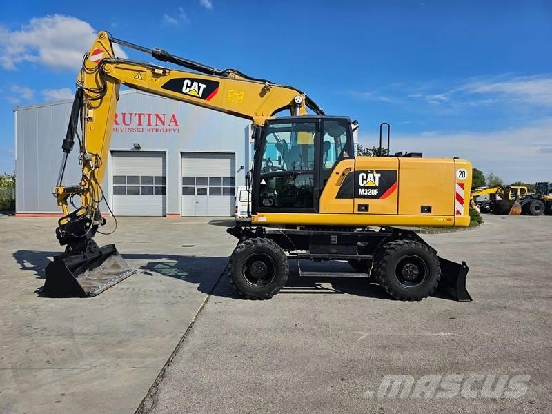 CAT M320F Bageri na kotačima