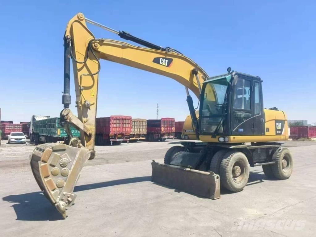 CAT M315D2 Bageri na kotačima
