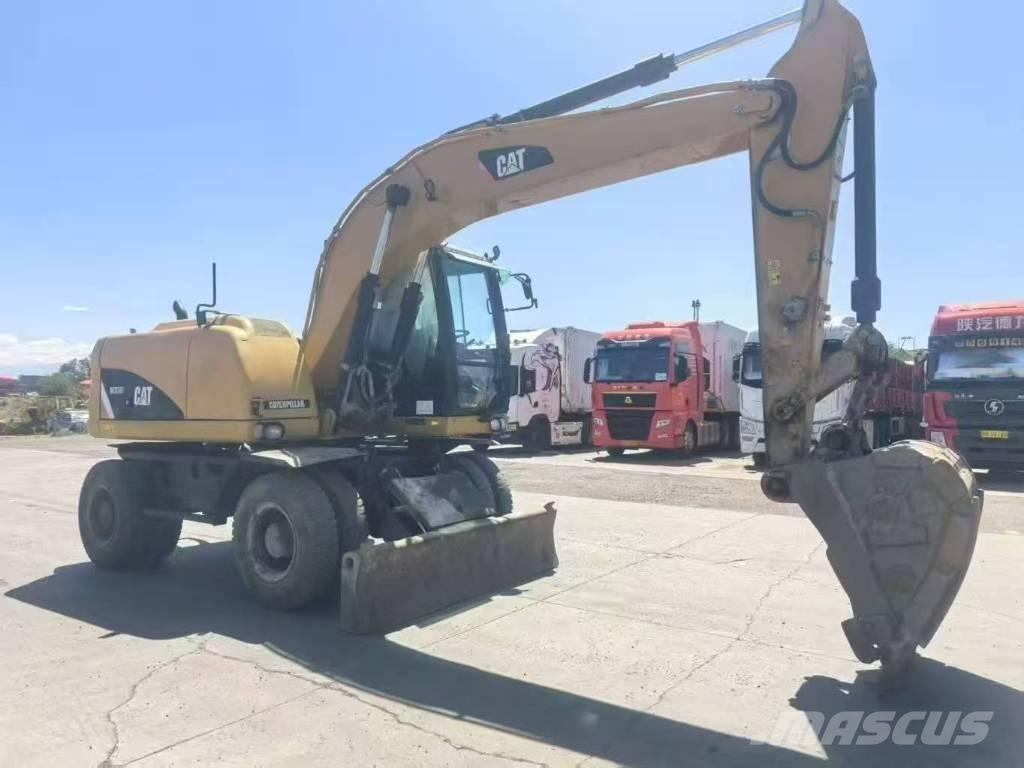 CAT M315D2 Bageri na kotačima