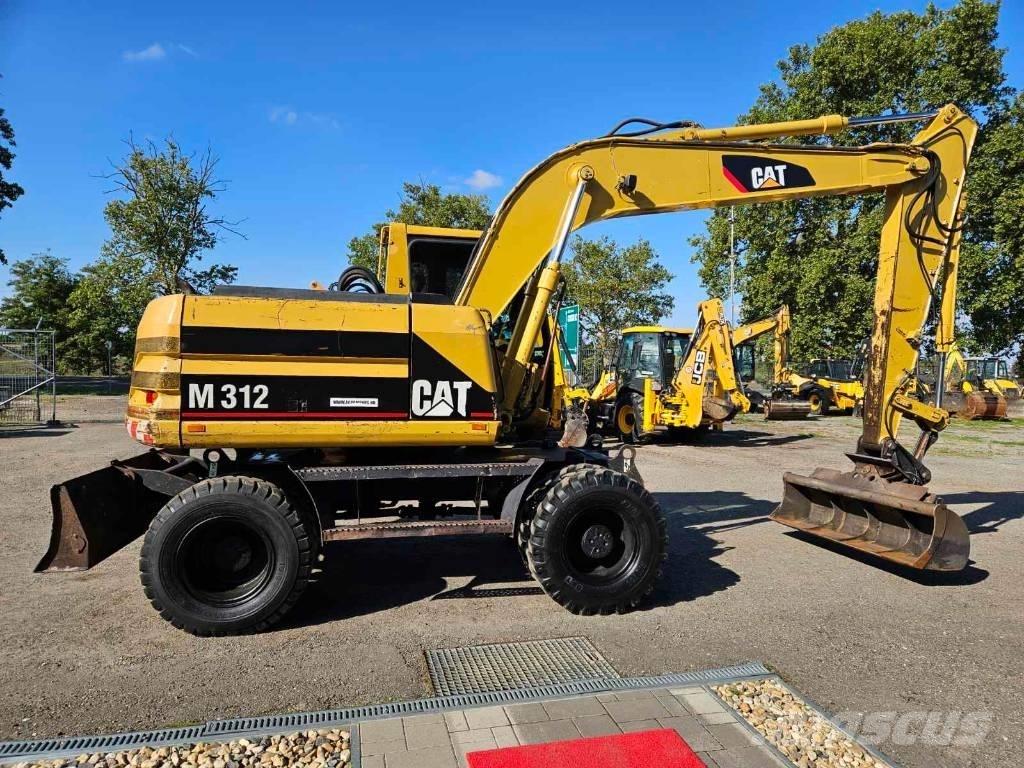 CAT M 312 Bageri na kotačima
