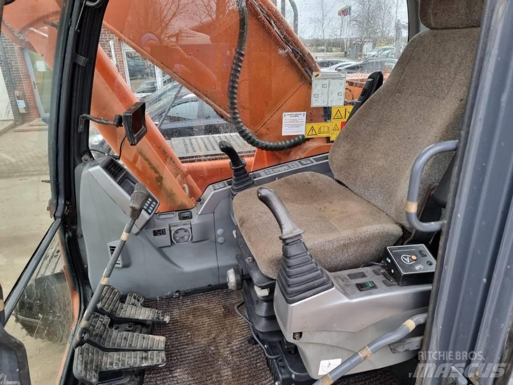 Doosan DX 225 LC Bageri gusjeničari