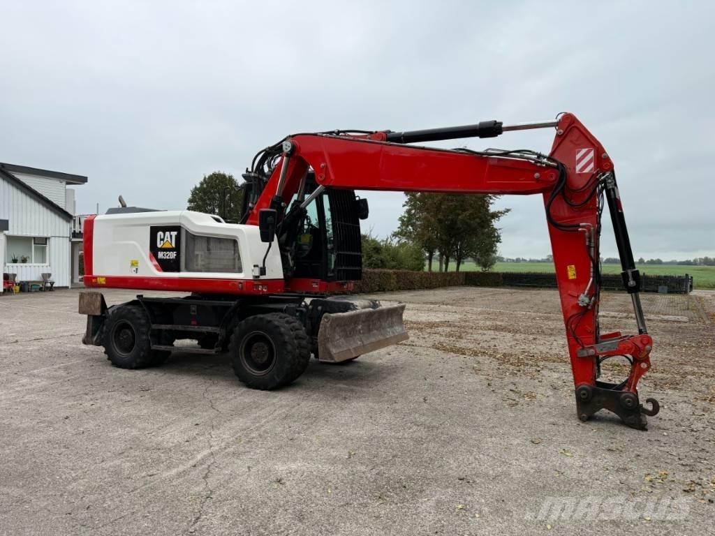CAT M320F Bageri na kotačima