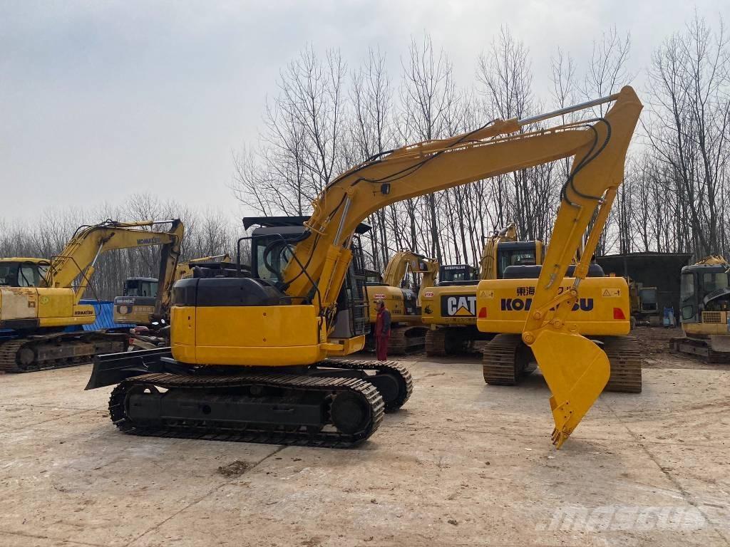 Komatsu PC128US Bageri gusjeničari