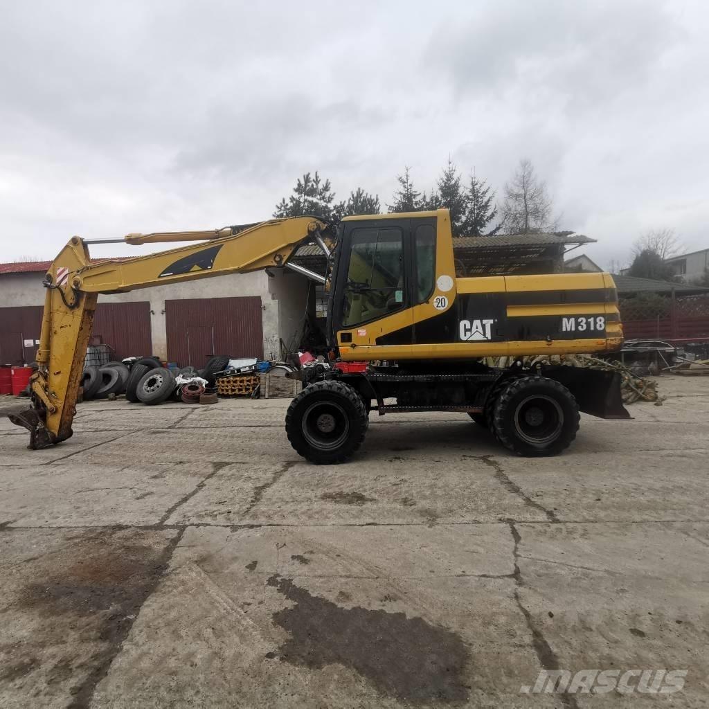 CAT M 318 B Bageri na kotačima