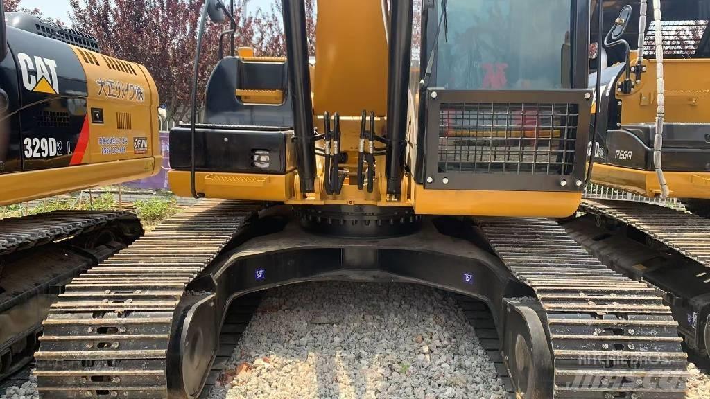 CAT 323 Bageri gusjeničari