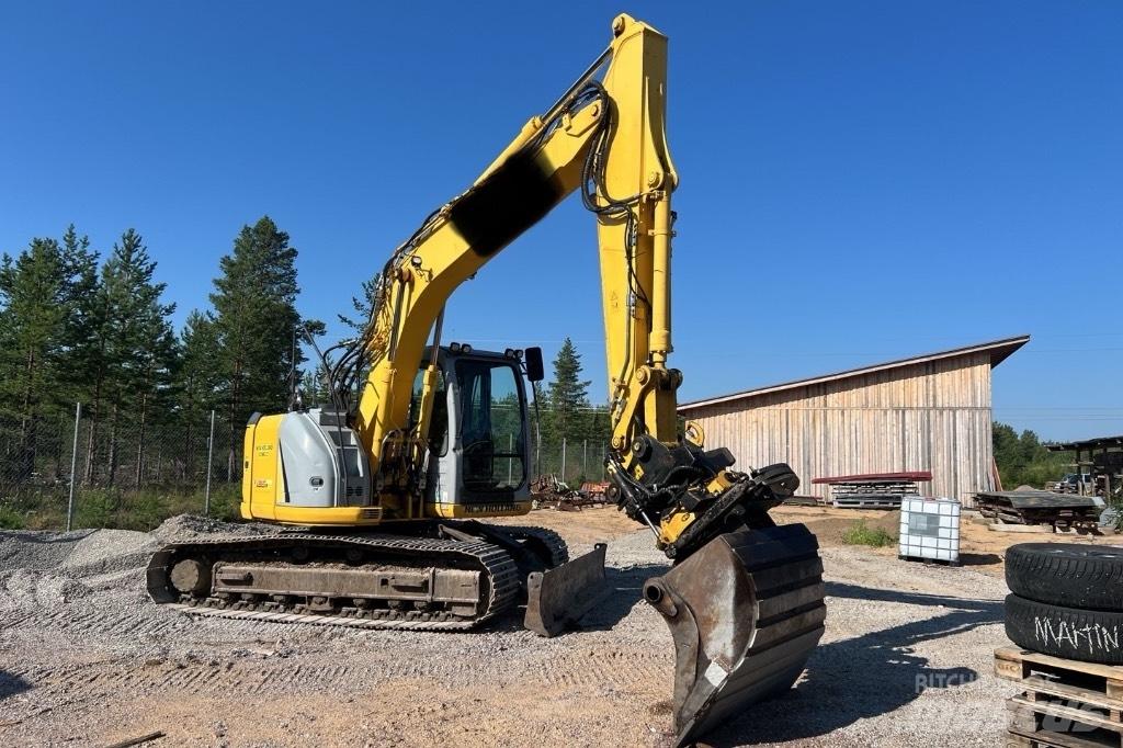 New Holland E 135 B Bageri gusjeničari