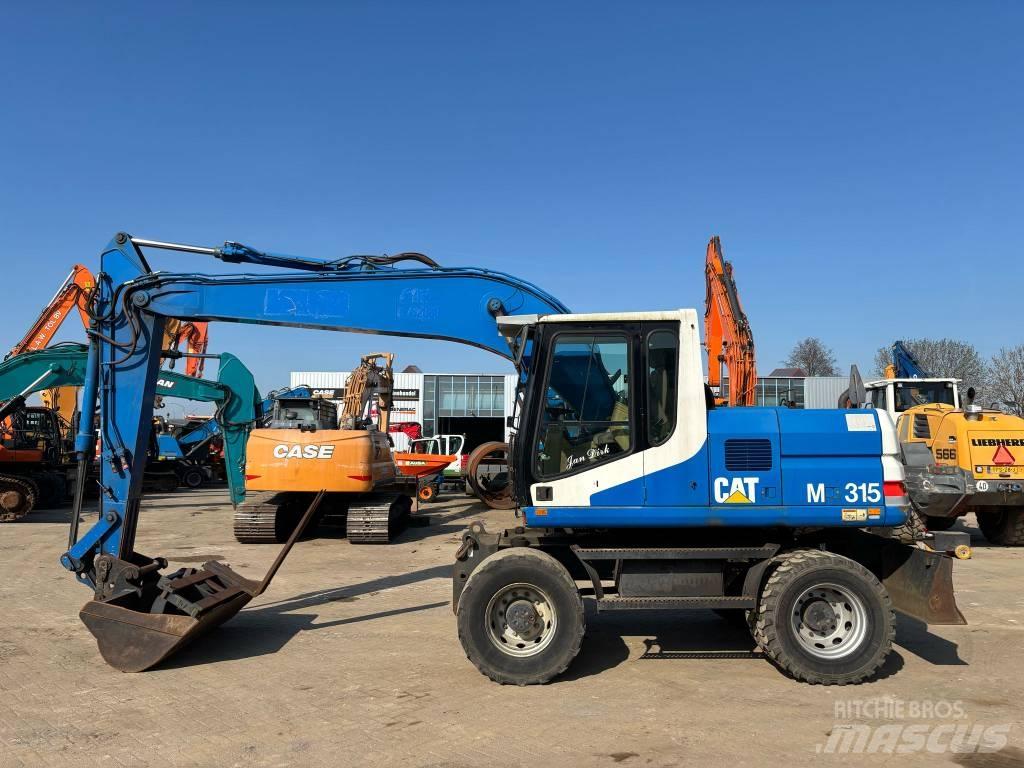 CAT M 315 Bageri na kotačima