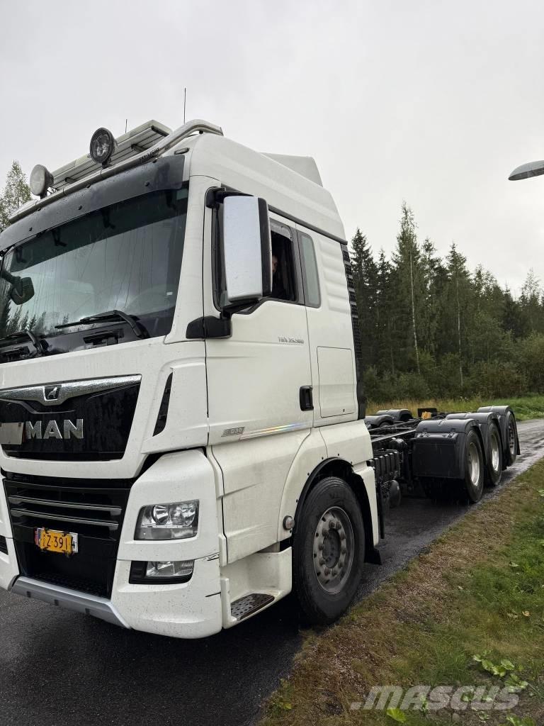 MAN TGX 32.580 Kamioni s ravnim pločom / vitlom