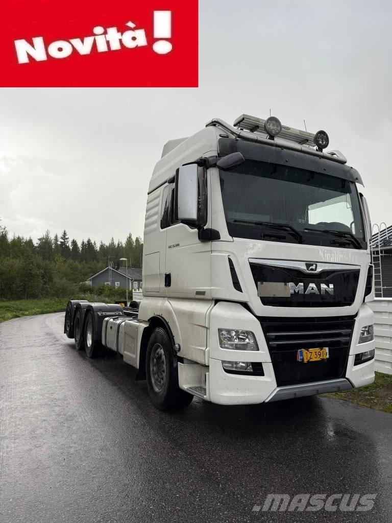 MAN TGX 32.580 Kamioni s ravnim pločom / vitlom