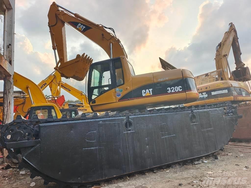 CAT 320 C Amfibijski bageri