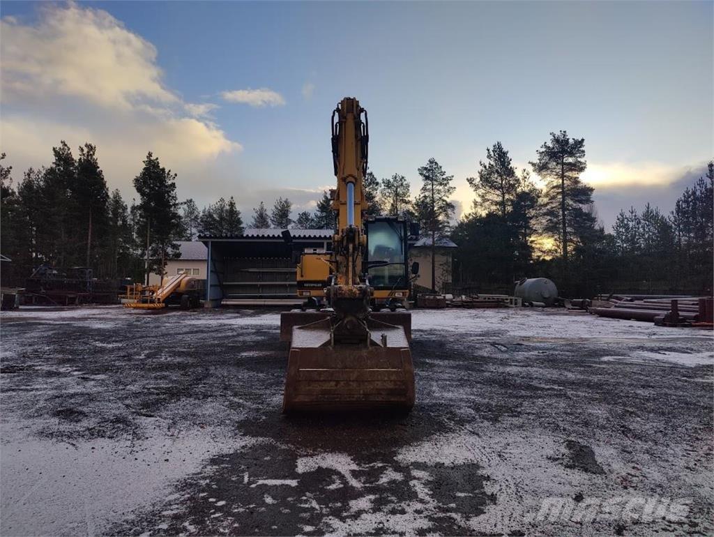 CAT M315 Bageri na kotačima