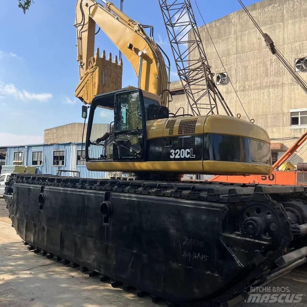 CAT 320 C Amfibijski bageri