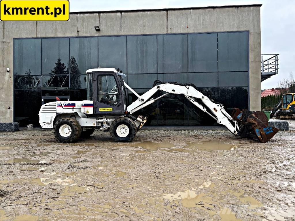 Mecalac 12 M TX Utovarni rovokopači