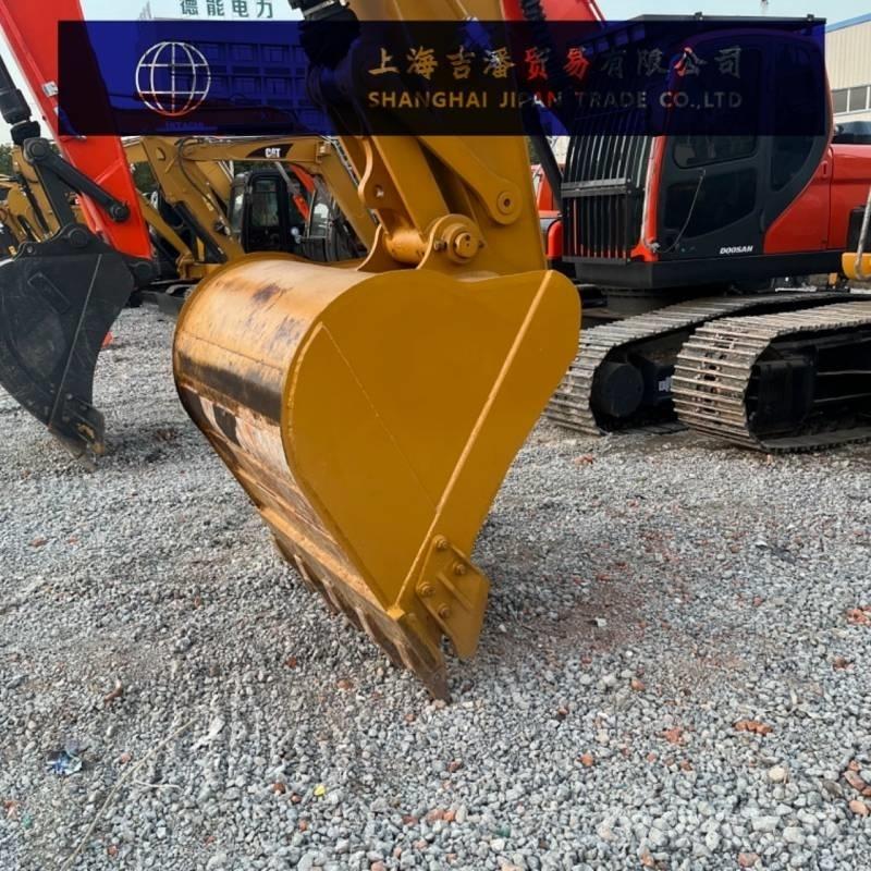 CAT 323 Bageri gusjeničari
