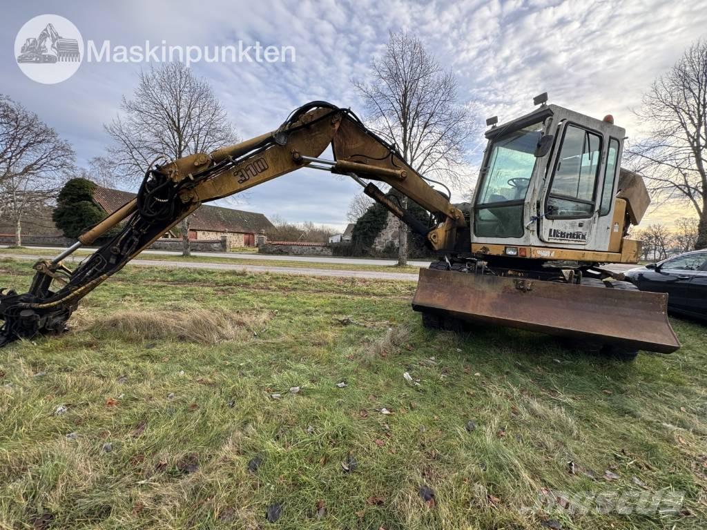 Liebherr A 310 B Bageri na kotačima