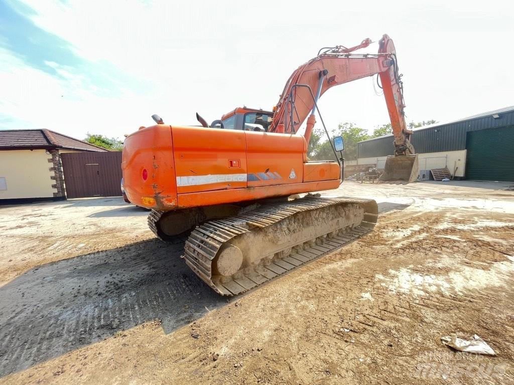 Doosan DX225 Bageri na kotačima