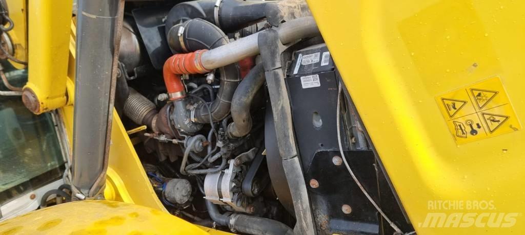 New Holland B 115 C Utovarni rovokopači