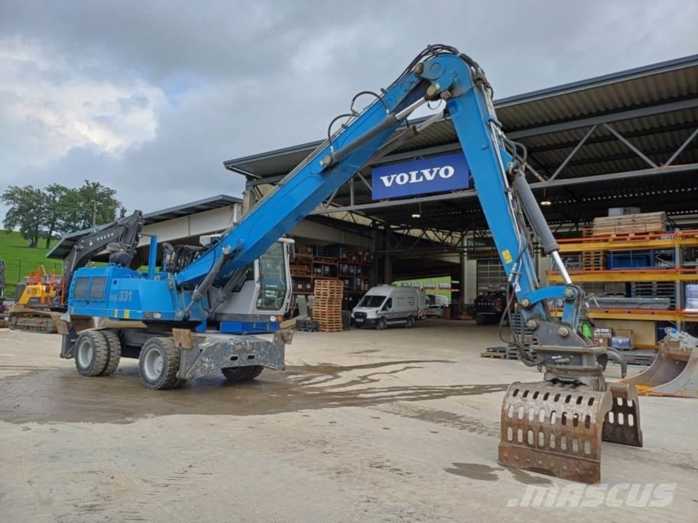 Fuchs MHL 331 Bageri za manipuliranje materijalom / otpadom