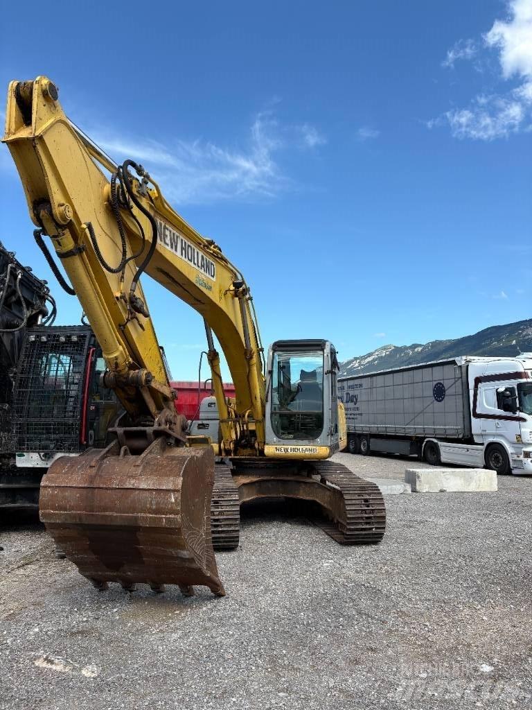 New Holland E 245 B Bageri gusjeničari