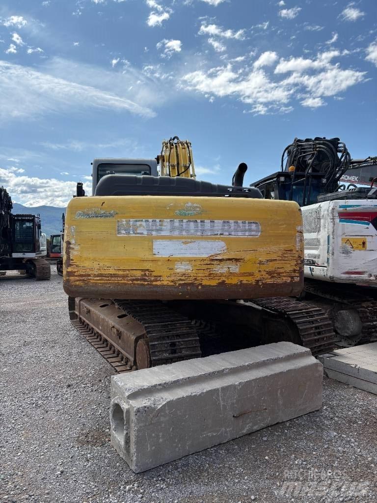 New Holland E 245 B Bageri gusjeničari