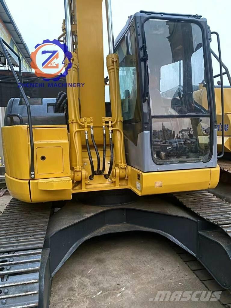 Komatsu PC 128 US Midi bageri 7t – 12t