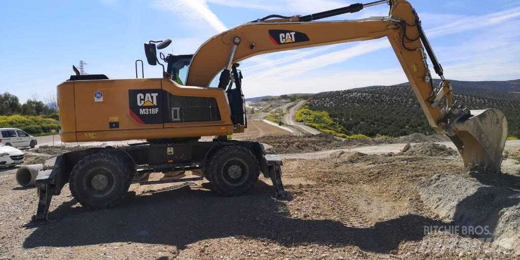 CAT M318F Bageri na kotačima