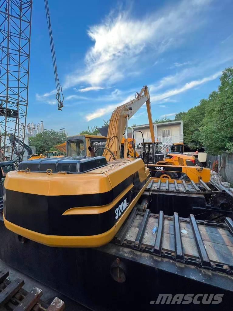 CAT 320BL Amfibijski bageri