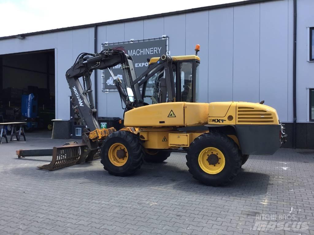 Mecalac 12 MXT Bageri na kotačima